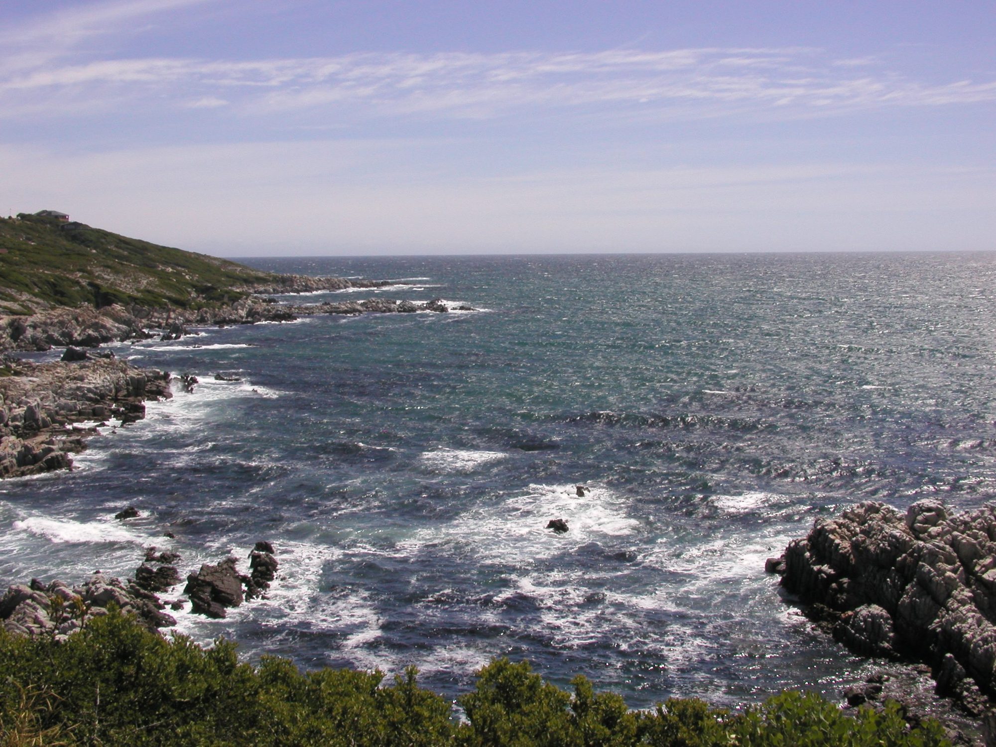 Rocky shore and cliffs at De Kelders, Walker Bay